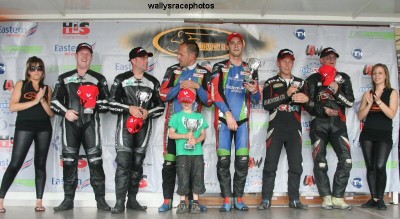 Race 1 Podium L to R Schofield, Thomas,  Reeves, Cluze,  Lovelock, Lawrence..jpg